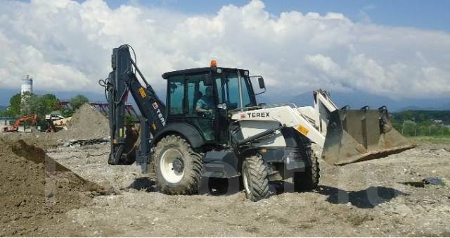 Аренда погрузчика TEREX TLB-825 для строительных задач