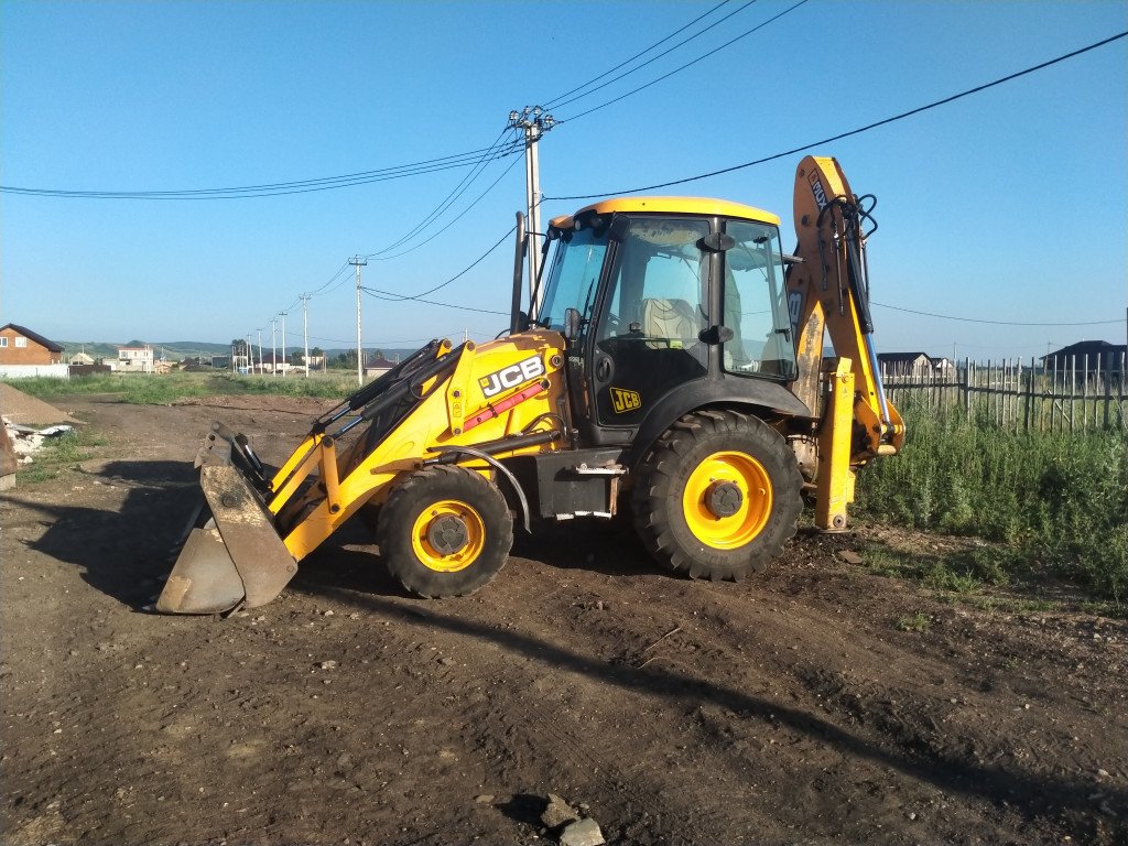 Экскаватор погрузчик JCB 3CX. Гидромолот, ямобур
