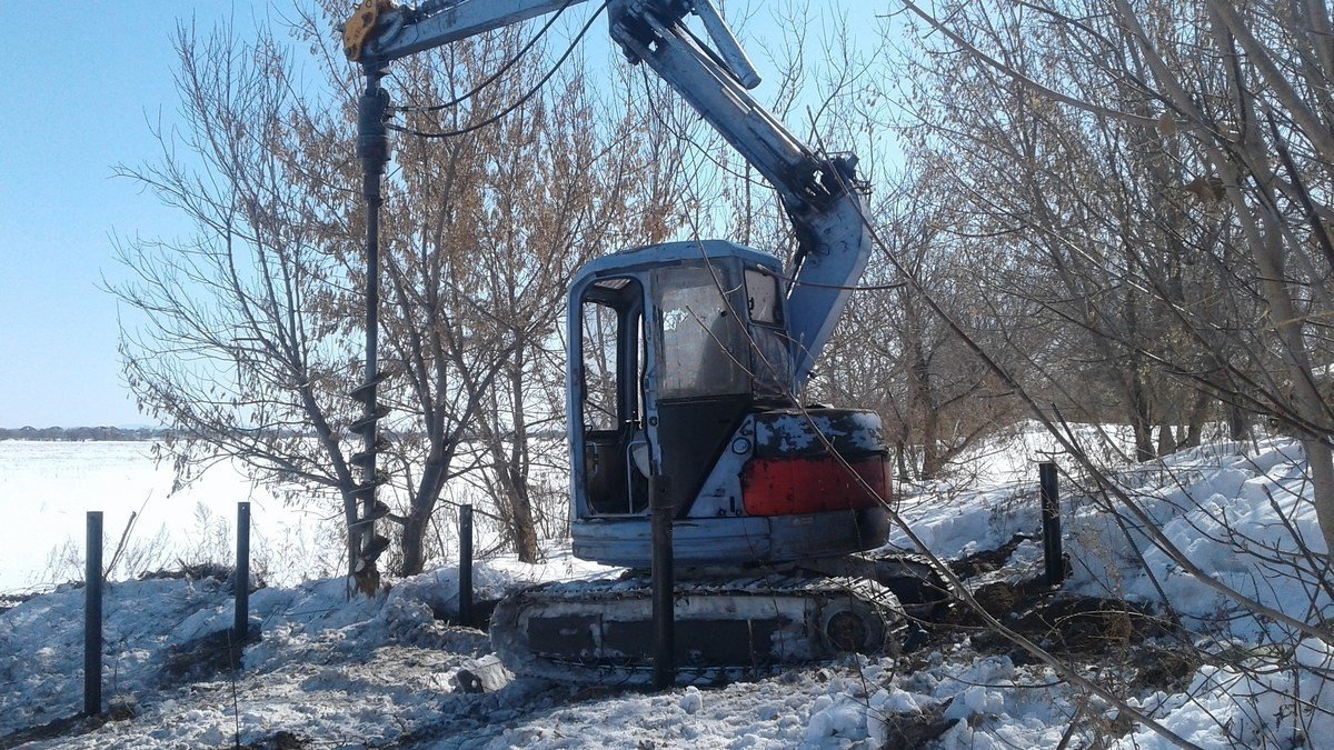 Аренда спецтехники ямобур Cat 305