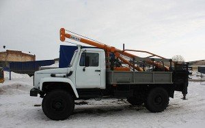Услуга ямобур с краном БКМ-317-01 аренда