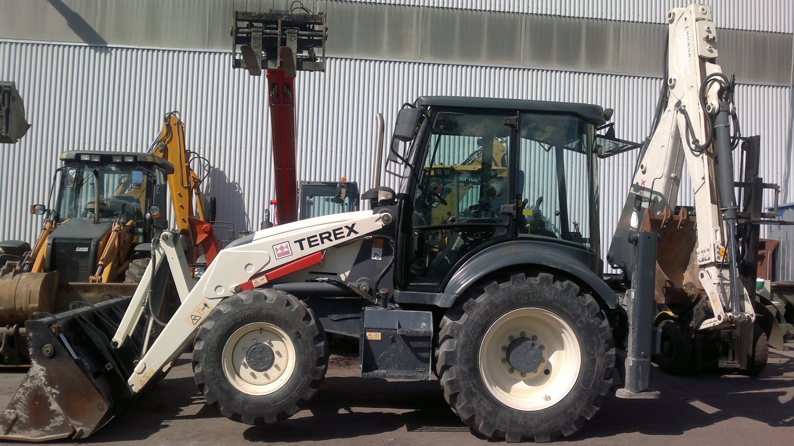 Гидромолот New Holland B80B с навесным